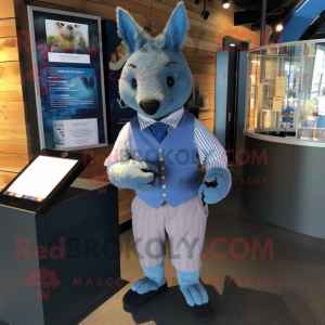 Blue Armadillo mascot costume character dressed with a Oxford Shirt and Cufflinks