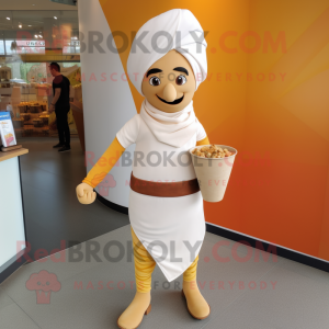 Cream Tikka Masala mascot costume character dressed with a Jeggings and Anklets
