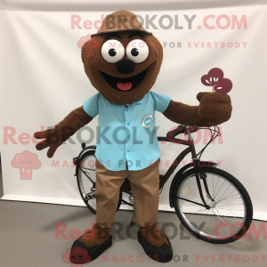Brun Monocyklista maskotka...