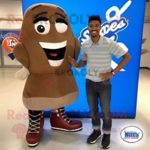 Brown Pair Of Ice Skates mascot costume character dressed with a Denim Shirt and Shoe clips