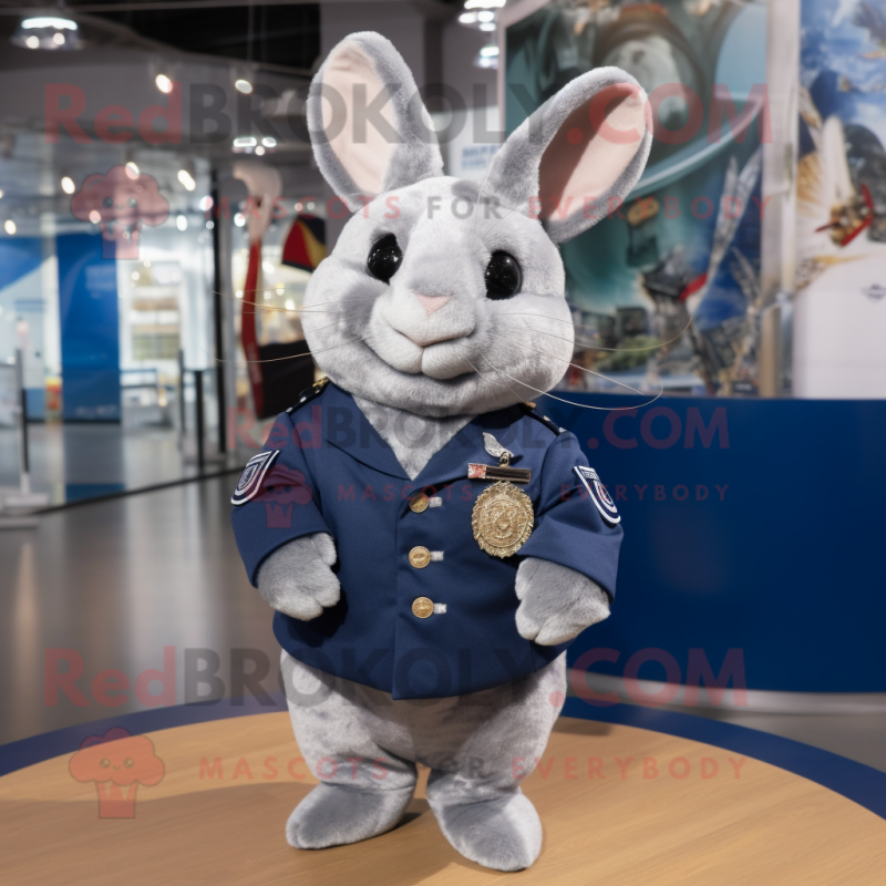 Navy Chinchilla mascot costume character dressed with a V-Neck Tee and Lapel pins Navy Chinchilla mascot costume character dressed with a V-Neck Tee and Lapel pins