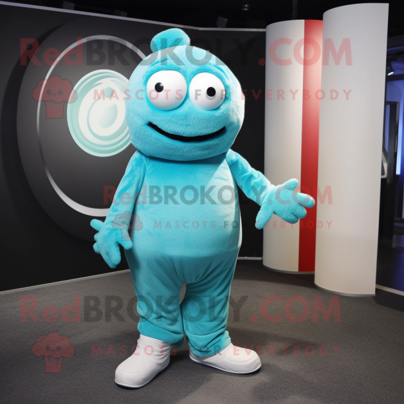 Cyan Golf Ball mascot costume character dressed with a Jumpsuit and Scarves