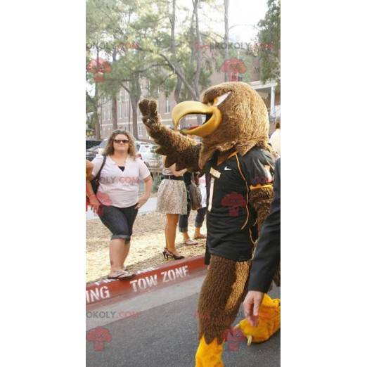 Mascota águila marrón y amarilla - Redbrokoly.com
