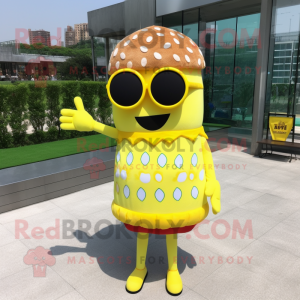 Lemon Yellow Burgers mascot costume character dressed with a Empire Waist Dress and Sunglasses
