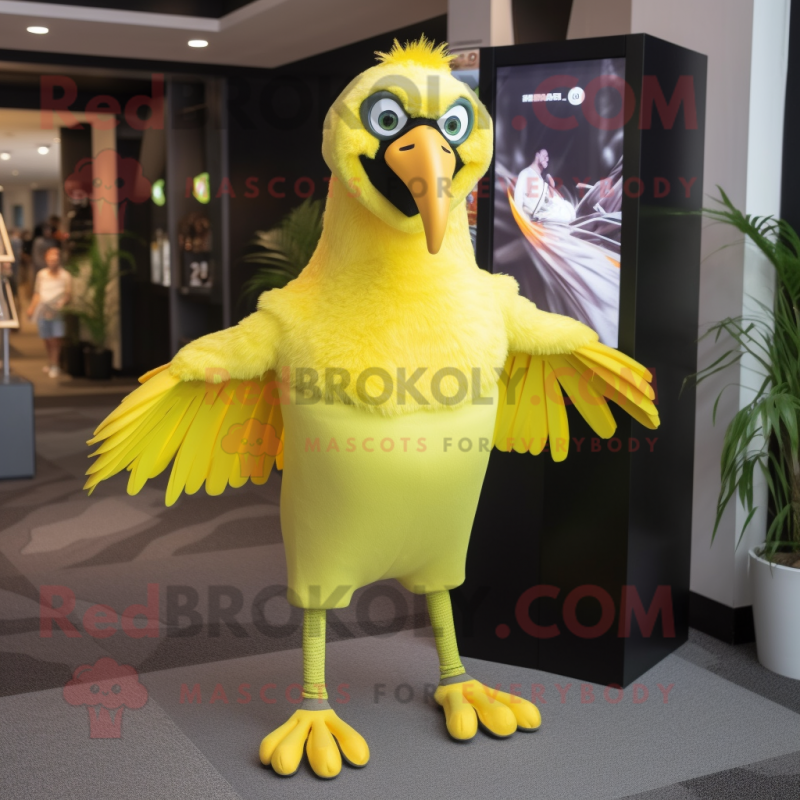 Lemon Yellow Vulture mascot costume character dressed with a Running Shorts and Mittens Lemon Yellow Vulture mascot costume character dressed with a Running Shorts and Mittens