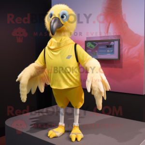 Lemon Yellow Vulture mascot costume character dressed with a Running Shorts and Mittens