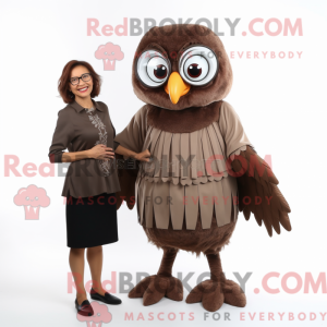 Mascotte de harpie marron...