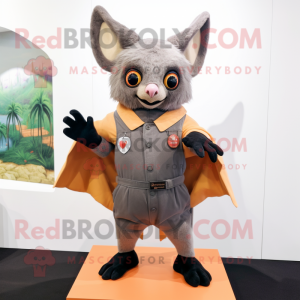 Olive Fruit Bat mascot costume character dressed with a Chinos and Mittens
