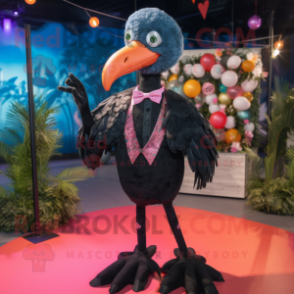 Black Flamingo mascot costume character dressed with a Cardigan and Rings