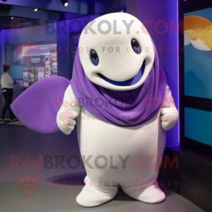 Purple Beluga Whale mascot costume character dressed with a Graphic Tee and Beanies