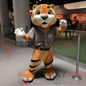 Brun sabeltand tiger maskot...