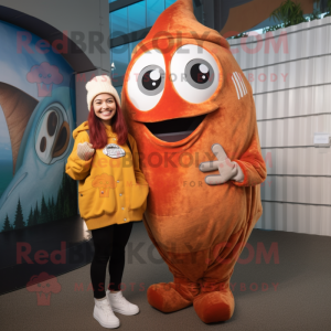 Rust Fish And Chips mascot costume character dressed with a Mini Dress and Beanies