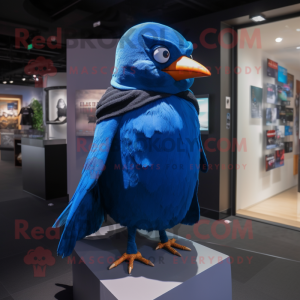 Blue Blackbird mascot costume character dressed with a Coat and Beanies