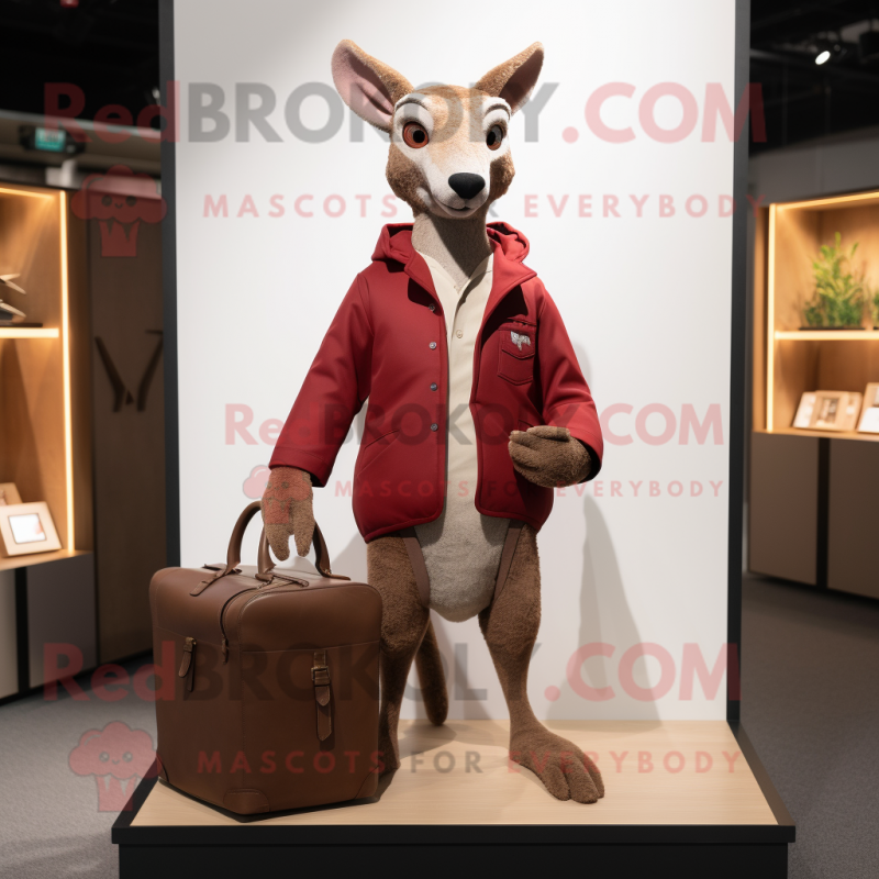 Maroon Kangaroo mascot costume character dressed with a Jacket and Briefcases Maroon Kangaroo mascot costume character dressed with a Jacket and Briefcases