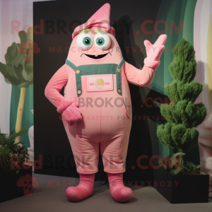 Pink Zucchini mascot costume character dressed with a Dungarees and Mittens