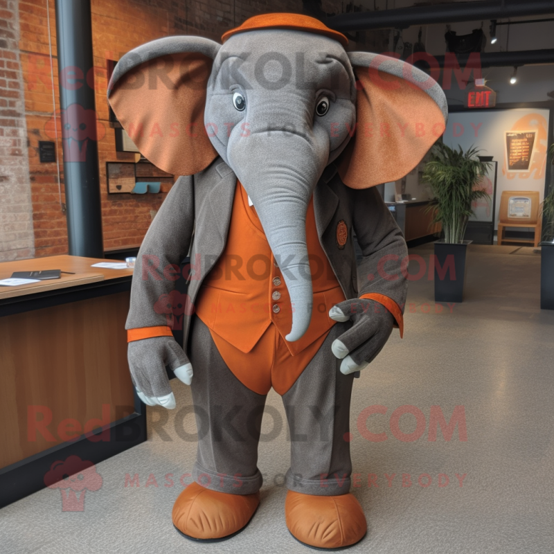 Rust Elephant mascot costume character dressed with a Suit Pants and Tie pins