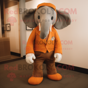 Rust Elephant mascot costume character dressed with a Suit Pants and Tie pins