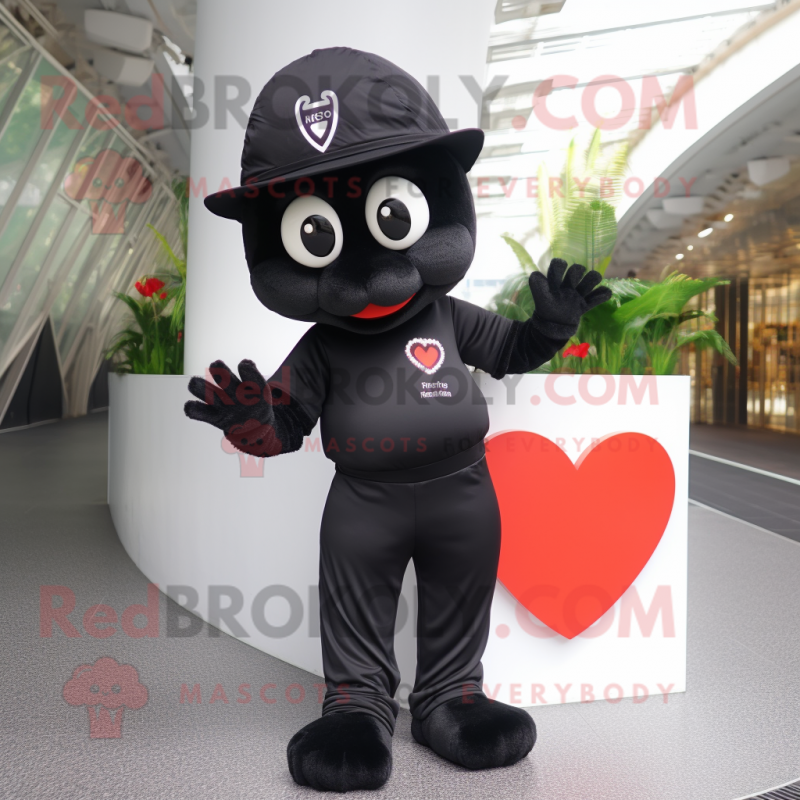 Black Arrow Of Love mascot costume character dressed with a Shorts and Caps Black Arrow Of Love mascot costume character dressed with a Shorts and Caps