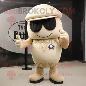 Beige Cyclops mascot costume character dressed with a Suit Pants and Caps