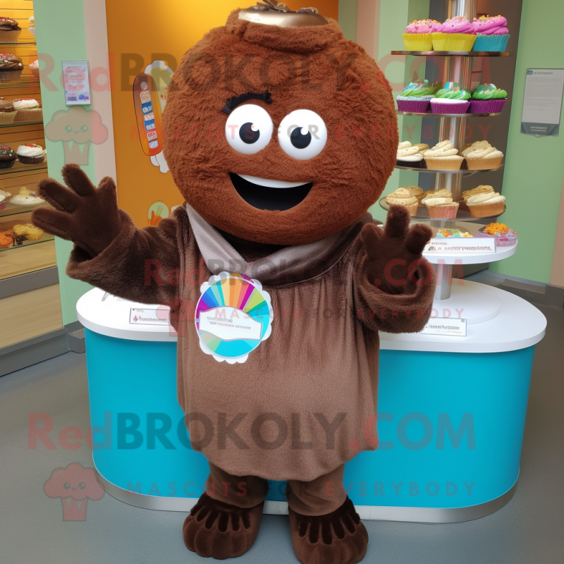 Brown Cupcake mascot costume character dressed with a Sweatshirt and Bracelets Brown Cupcake mascot costume character dressed with a Sweatshirt and Bracelets