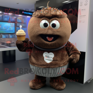 Brown Cupcake mascot costume character dressed with a Sweatshirt and Bracelets