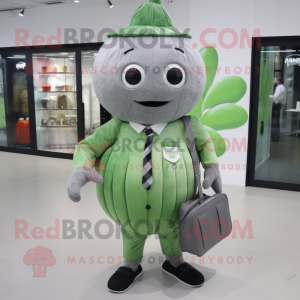 Gray Watermelon mascot costume character dressed with a Button-Up Shirt and Clutch bags