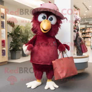 Maroon Kiwi mascot costume character dressed with a Capri Pants and Handbags