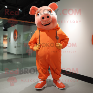 Orange Pig mascot costume character dressed with a Jumpsuit and Shoe laces