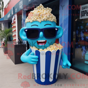 Blå Pop Corn maskot...