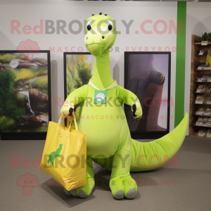 Lime Green Brachiosaurus mascot costume character dressed with a Oxford Shirt and Tote bags