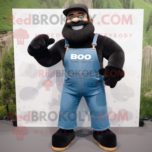 Black Strongman mascot costume character dressed with a Boyfriend Jeans and Suspenders
