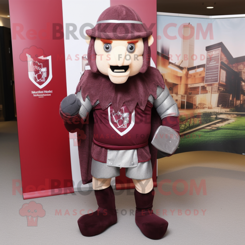 Maroon Medieval Knight mascot costume character dressed with a Rugby Shirt and Earrings