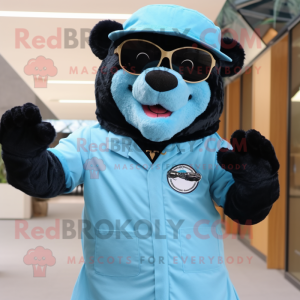 Sky Blue Spectacled Bear mascot costume character dressed with a Jumpsuit and Hat pins
