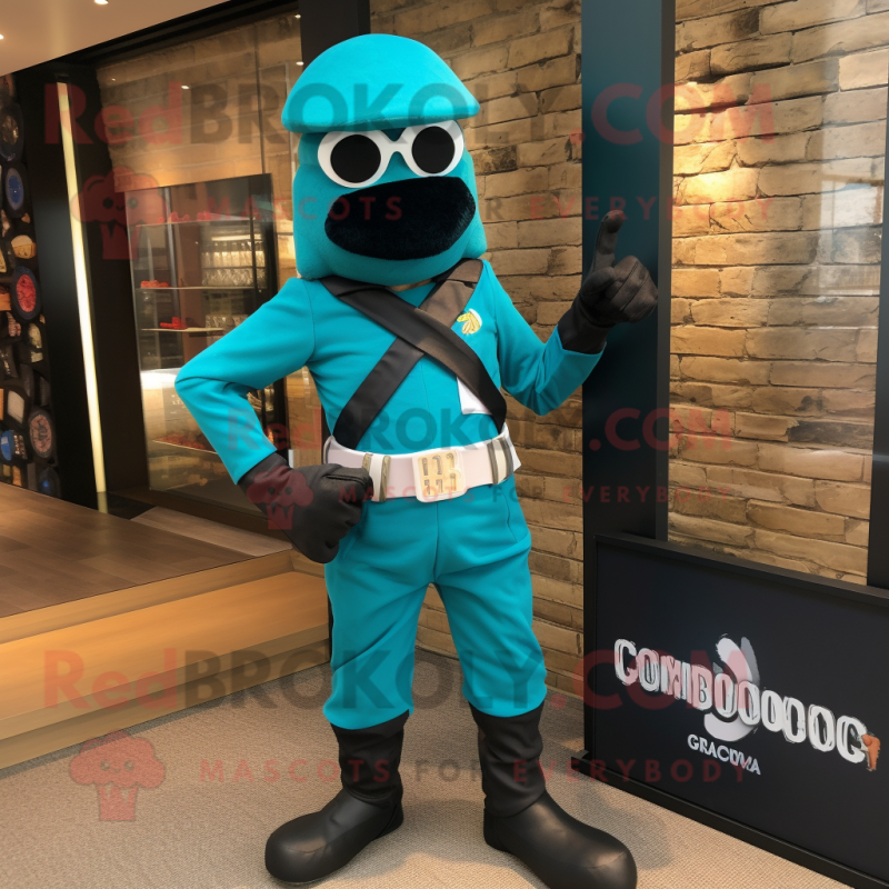 Turquoise Para Commando mascot costume character dressed with a Waistcoat and Cufflinks Turquoise Para Commando mascot costume character dressed with a Waistcoat and Cufflinks