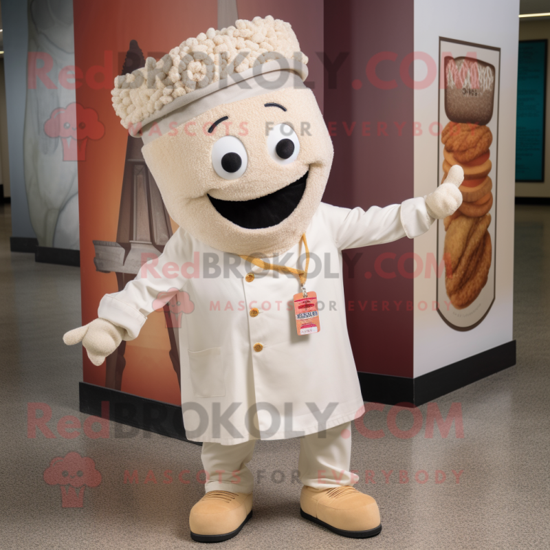 Cream Jambalaya mascot costume character dressed with a Chinos and Brooches Cream Jambalaya mascot costume character dressed with a Chinos and Brooches