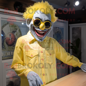 Lemon Yellow Evil Clown mascot costume character dressed with a Chambray Shirt and Sunglasses