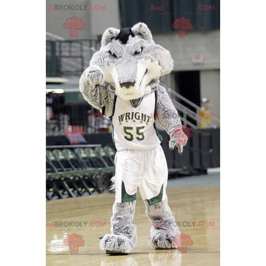 Mascotte de loup gris et blanc en tenue de basketteur -