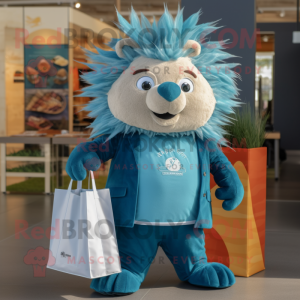 Teal Porcupine mascot costume character dressed with a Poplin Shirt and Tote bags