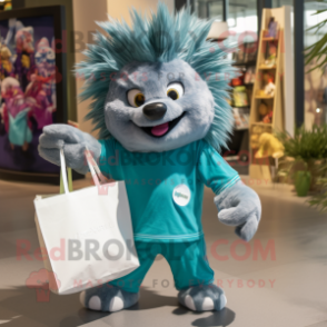 Teal Porcupine mascot costume character dressed with a Poplin Shirt and Tote bags
