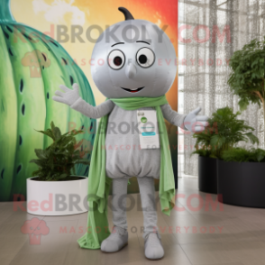 Silver Melon mascot costume character dressed with a Skinny Jeans and Scarves