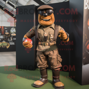 Brown Para Commando mascot costume character dressed with a Rugby Shirt and Belts