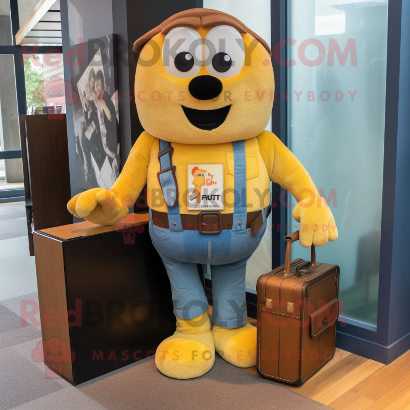 Gold Shepard'S Pie mascot costume character dressed with a Boyfriend Jeans and Briefcases