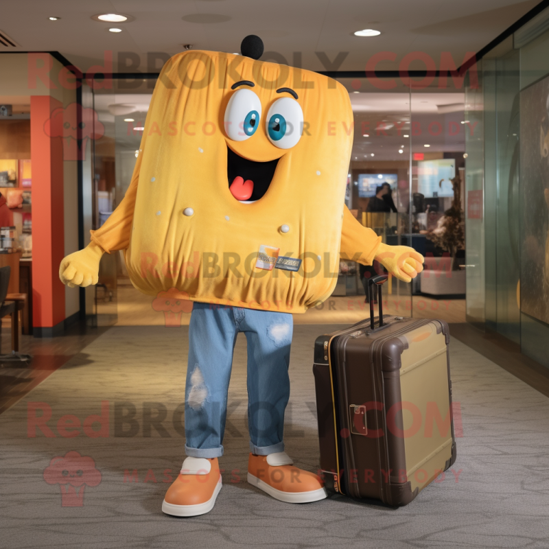 Gold Shepard'S Pie mascot costume character dressed with a Boyfriend Jeans and Briefcases Gold Shepard'S Pie mascot costume character dressed with a Boyfriend Jeans and Briefcases