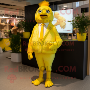Lemon Yellow Hens mascot costume character dressed with a Suit Jacket and Foot pads