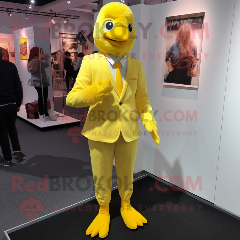 Lemon Yellow Hens mascot costume character dressed with a Suit Jacket and Foot pads