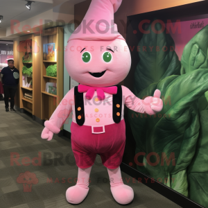 Pink Spinach mascot costume character dressed with a Dress Pants and Suspenders