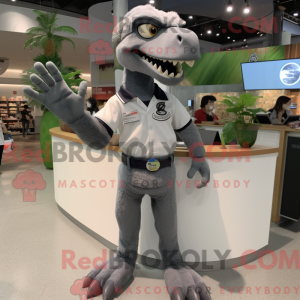 Grå Deinonychus...