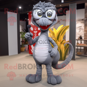 Gray Hydra mascot costume character dressed with a Flare Jeans and Eyeglasses