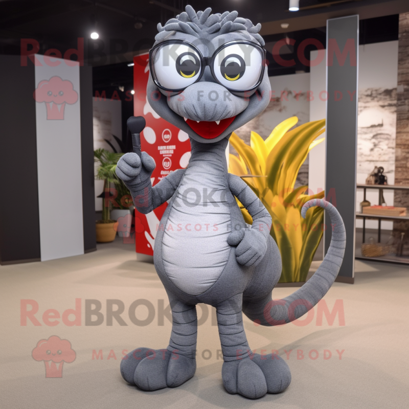 Gray Hydra mascot costume character dressed with a Flare Jeans and Eyeglasses
