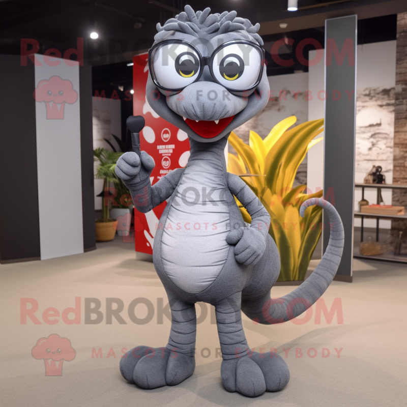 Gray Hydra mascot costume character dressed with a Flare Jeans and Eyeglasses Gray Hydra mascot costume character dressed with a Flare Jeans and Eyeglasses